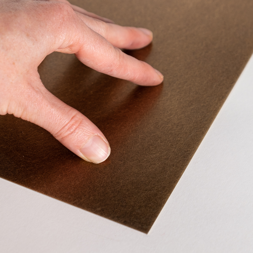 Messingblech patiniert, mit Schliff